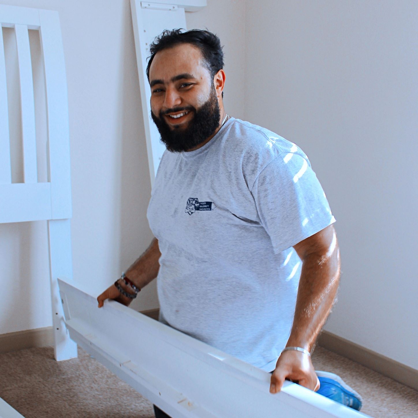 YBM crew member displaying the option for YBM to assemble and disassemble